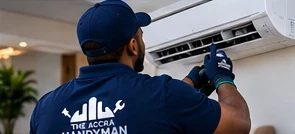 Technician servicing an air conditioner